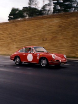 Old car racing down the road